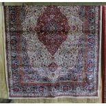 Red ground Kashmir Floor Rug, traditional medallion design, 2.40m x 1.55m