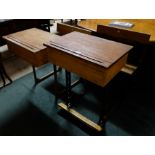 Two single sized school desks with hinged lids, on metal bases (1 stamped Hearne & Co)