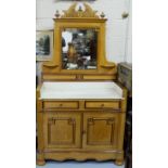 Gothic Yew wood Washstand, with a mirror back over a base of two drawers and two doors enclosing