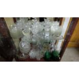 2 shelves of glass ware including moulded dessert bowls, fruit baskets, jugs etc