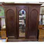 Large 3-door mahogany Wardrobe, with central mirrored panel, hanging robes on either side and a bank