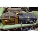 2 steel trunks (with Strahan labels), 1 leather trunk and a canvas suitcase (4)