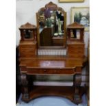 Victorian Mahogany Duchesse Dressing Table, with a swivel mirror back between a gallery of drawers