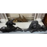 Similar Pair of Cast Iron Fire Dogs - one in the form of a Lion (28”w x 15”h) & one a seated