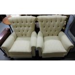 Matching Pair of Fireside Armchairs, recently recovered with cream fabric, buttoned backs, on ball