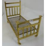 Model of Edwardian Brass Bed, square rails, with metal base, castors, 21”long x 11”d