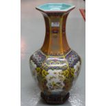 Tall Porcelain Vase, bottle neck shaped, blue and gold ground, decorated with continuous floral