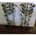 Matching Pair of Wrought Iron Pierced Jardinière baskets, on stands, decorated in relief with flower