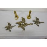 3 gilded white metal figures of sporting birds, possible Russian & a pair of brass bookends in the