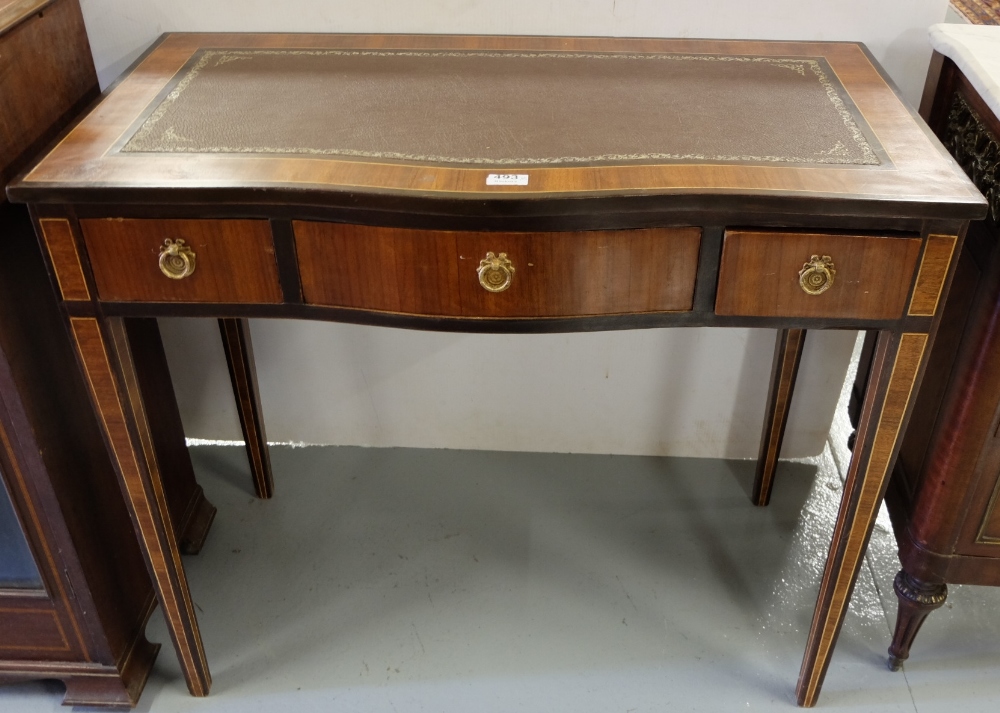 Inlaid serpentine front side table/desk, with tooled brown leatherette top, 3 apron drawers, on