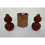 3 Pieces of Chinese lacquer incl. a pair of red overlaid low-sized double gourd vases 6”h & a