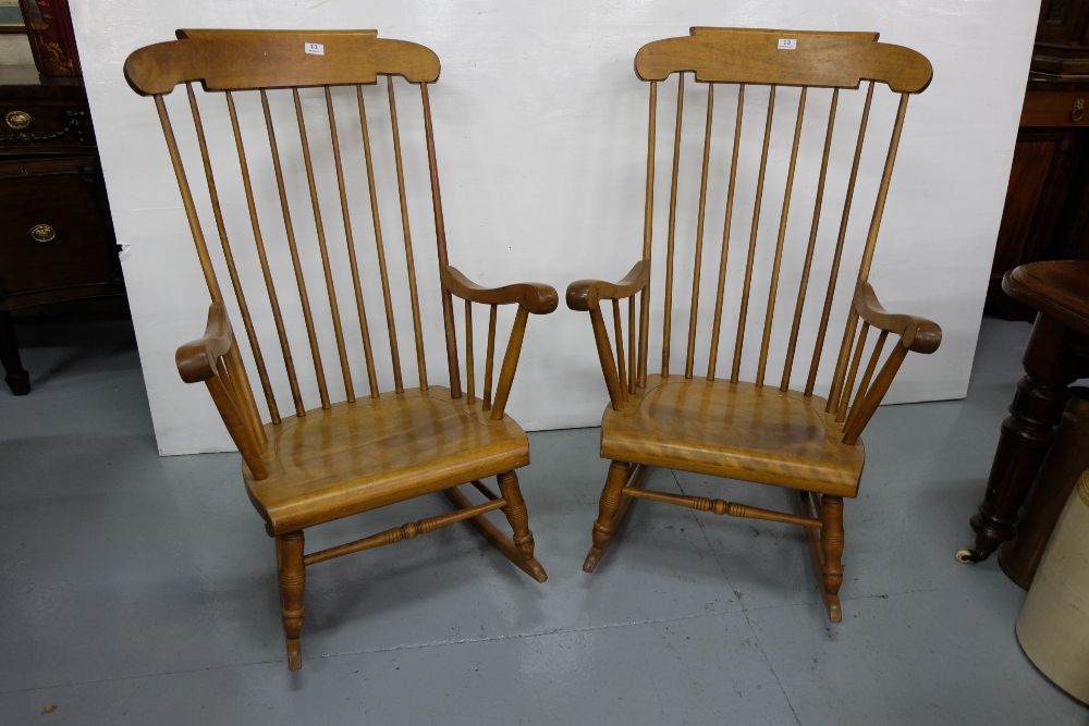 Matching Pair of High Back Beech Rocking Chairs, with spindle backs and side arms.