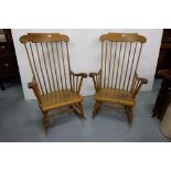 Matching Pair of High Back Beech Rocking Chairs, with spindle backs and side arms.