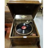 H.M.V. Record Player “Columbia Grafonola”, in an oak case, with box of records – classical, Irish