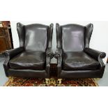 Matching Pair of Wingback Armchairs, covered in brown leatherette fabric, on cabriole legs,