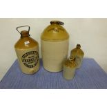 4 stoneware Whiskey Jars, various sizes – 1 tall “Powers Whiskey A474”, 1 Franklin’s Ginger Beer,