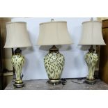 Matching Pair of yellow and black cameo glass table lamps (electric) and a similar oval shaped table