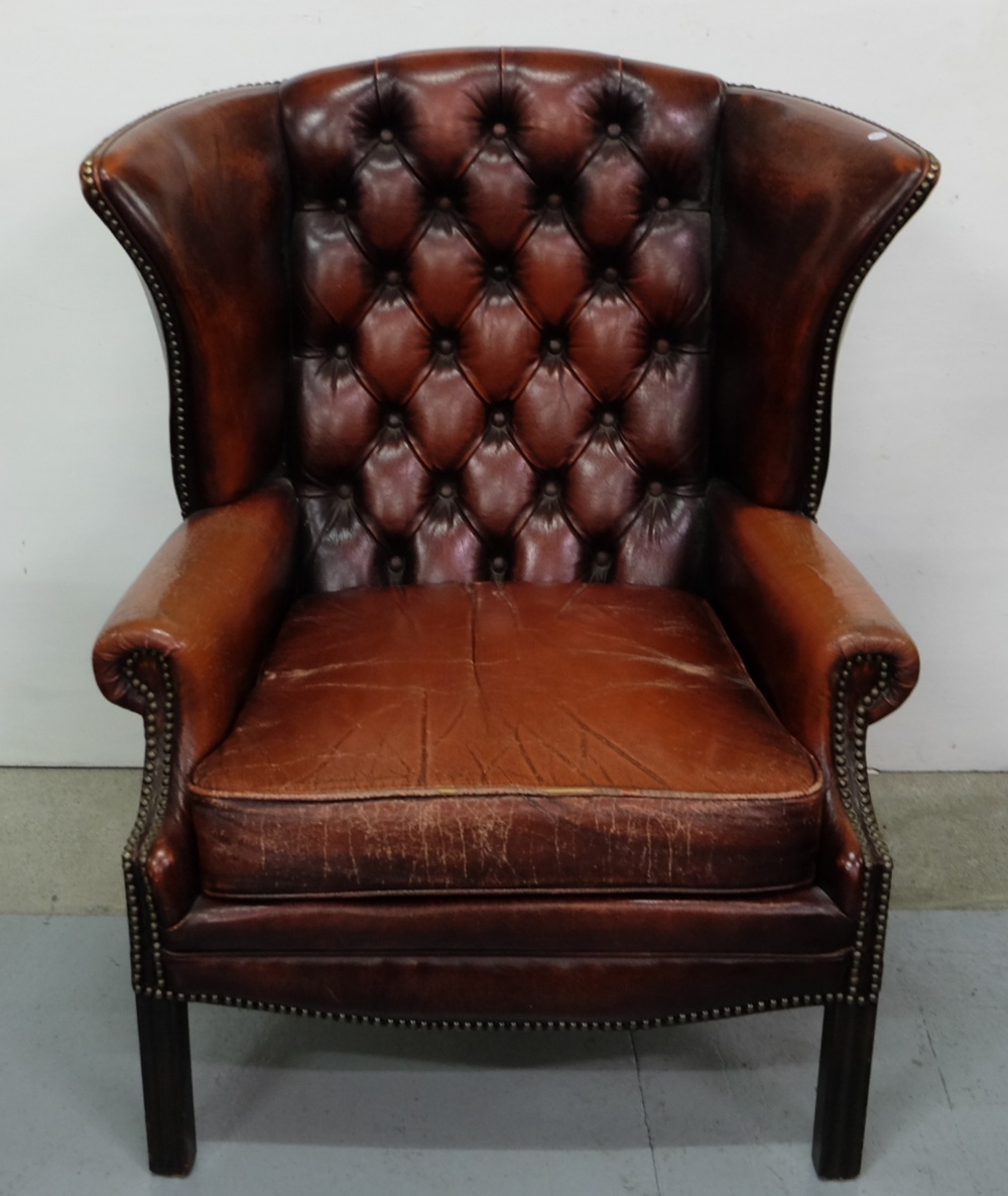 Red Leather Covered Wingback Armchair, with buttoned back and loose cushioned seat, on square legs