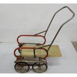 A 1950’s Triang Child’s Push Cart, painted red