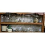 Top Two Shelves of Glassware and bottom shelf of glass items incl. Vases, lamp shades, bottles etc