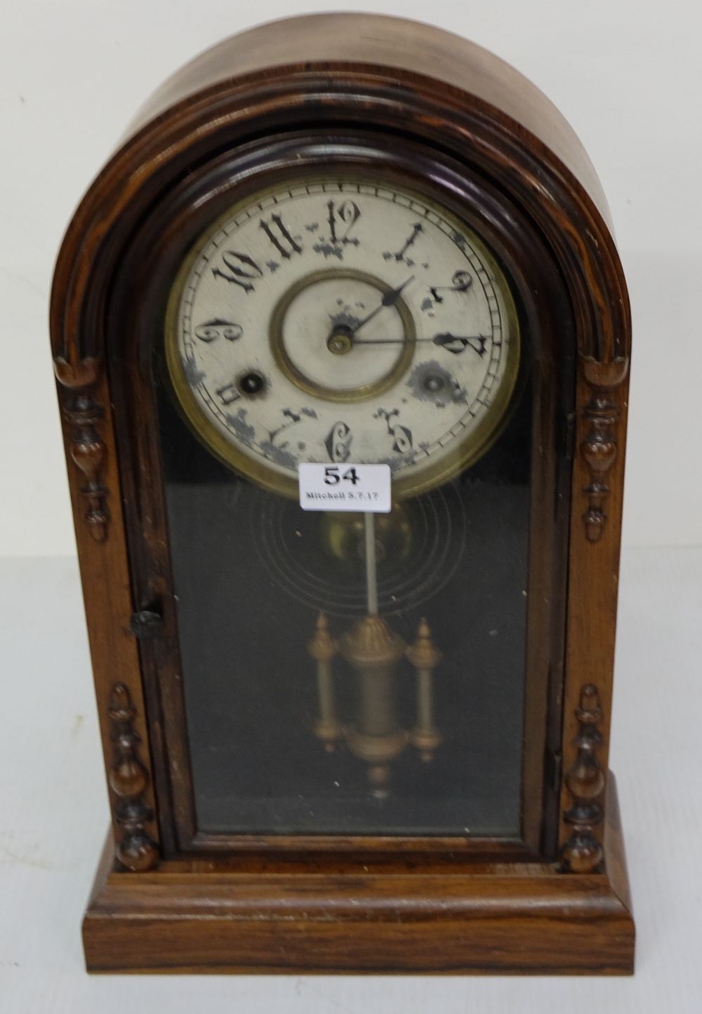 Walnut Cased Jerome Striking Mantle Clock, with visible pendulum