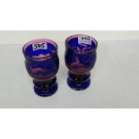 Pair of Bohemian Purple Glass Goblets with pink tops, both etched with deers, each 6”h