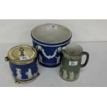 Blue and white Wedgewood Jasperware Jardinere and a similar biscuit jar, a green Wedgwood (3)