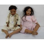 Two Porcelain Dolls – Indian boy & girl in white and pink costumes