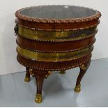 Oval Wine Cooler with brass banding, on gold hoof feet, with liner (27” w) (back leg weak)