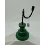 Antique Metal Table Rush Light (12”h), on a circular green pine stand