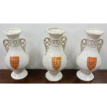 Set of 3 cream porcelain “I.H.S.” Vases, each 12”h