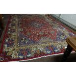 Old red ground Persian Kashmir carpet with bespoke under earth design and border decorated with