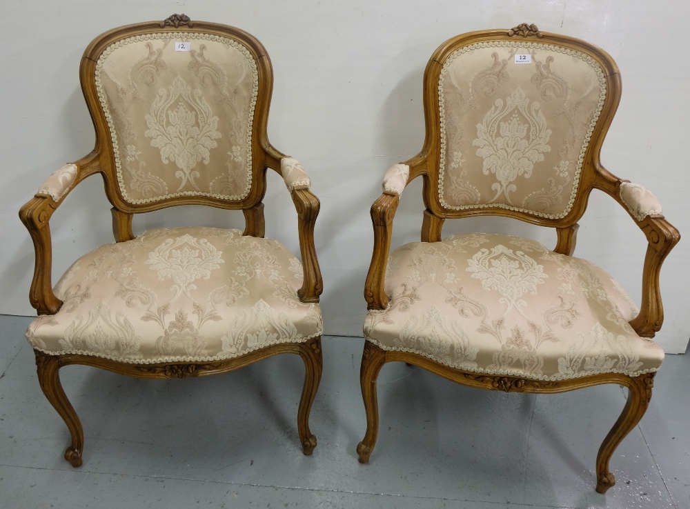 Matching Pair of Walnut Framed Salon Armchairs, with cream padded seats and backs, cabriole legs