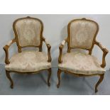 Matching Pair of Walnut Framed Salon Armchairs, with cream padded seats and backs, cabriole legs