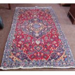 Old red ground Persian Kashan with a traditional Kashan design 1.97m x 1.1m