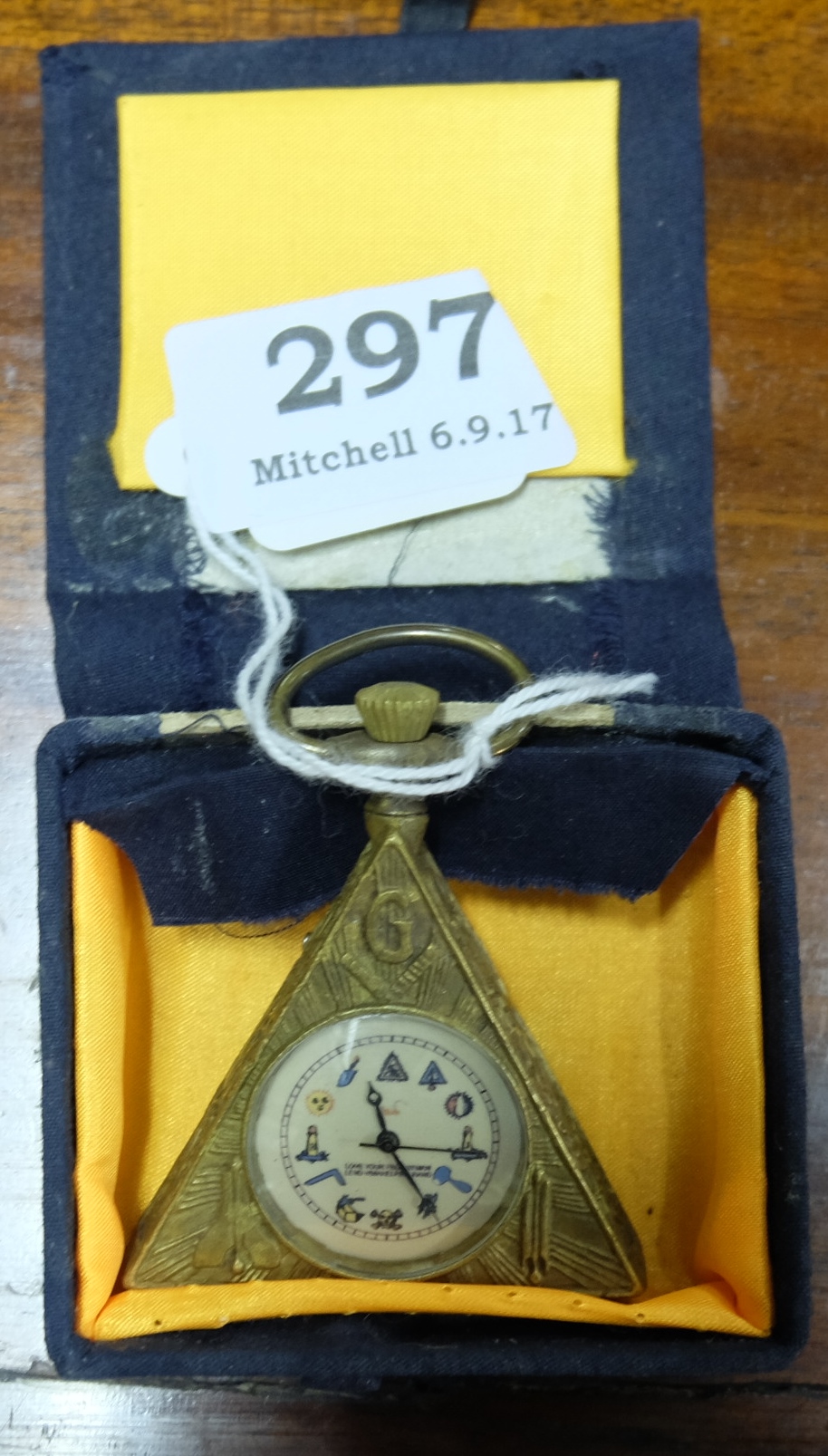 Triangular-shaped pocket watch, Masonic symbols