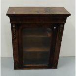 Regency Walnut Pier Cabinet with a single glass fronted door enclosing shelves, brass mounts (for