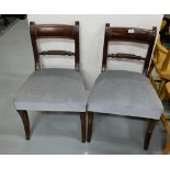 Matching Pair of Mahogany Dining Chairs with blue padded seats, sabre front legs