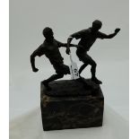 Bronze Group of Two Soccer Players (9”h), on a tall black marble base