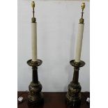 Matching Pair of Tall Brass Steffle Lamps (American), a circular column over impressed bowls, each