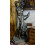 Tall Bronze Figure of an early Roman Man/God, nude and standing by a plinth with rams head, on a