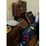 7 modern suitcases, various sizes & a leather briefcase