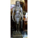 Bronze Life Size Figure of an Egyptian Woman in traditional dress, on a stepped base, 75”h