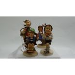 4 Goebel Figures – young girls and boy on swing etc (1 with chip)