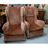 Matching Pair of High Wingback Armchairs, covered with pink velour fabric, button feet