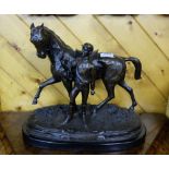 Bronze Study of a triumphant Jockey leading his Horse, “Vainqueur III”, on an oval black marble