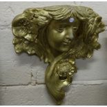 Concrete wall figure of classic lady's head, painted gold, 15"h