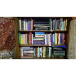 3 shelves of modern medical and philosophy related books & G.P’s travel case with instruments & “