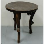 Carved African Occasional Table with a circular top 22” dia, 25”h, on 3 shaped legs