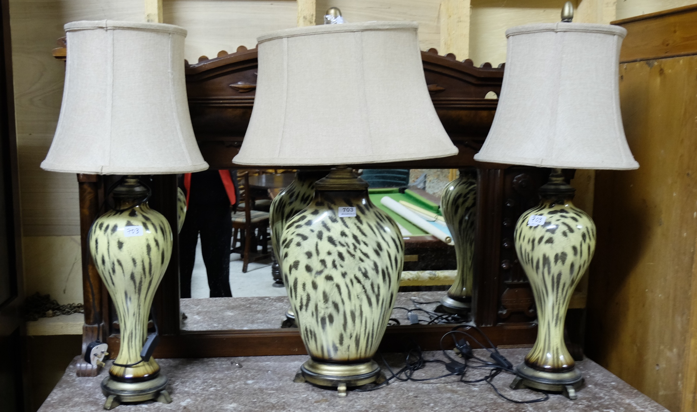 Matching Pair of yellow and black cameo glass table lamps (electric) and a similar oval shaped table